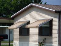 two single tan awnings