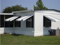 three separate window awnings