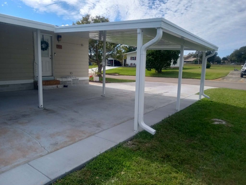 Side view of carport extension on Titusville modular home showing aluminum construction