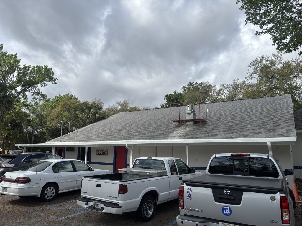 Insulated aluminum walkway cover under construction at American Legion in Titusville Florida